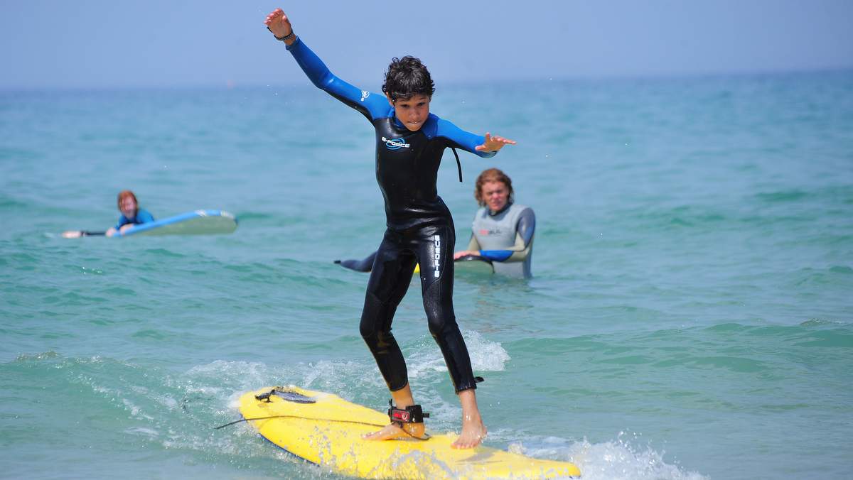where to go family uk cornwall surfing